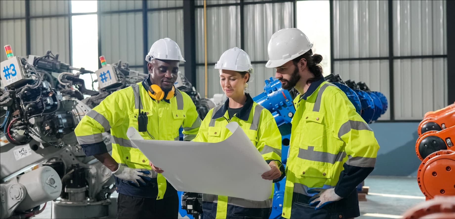 Construction site with workers and cranes